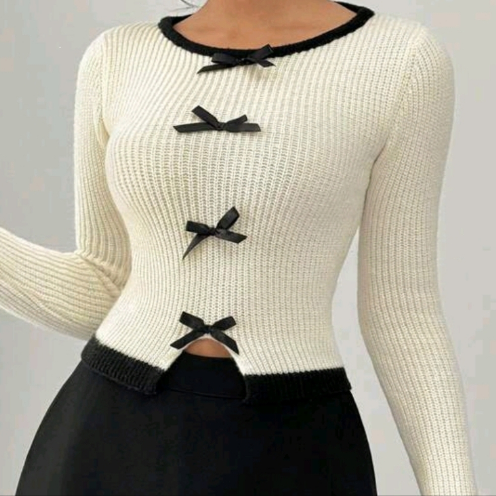 Cream Sweater with Black Bow Accents